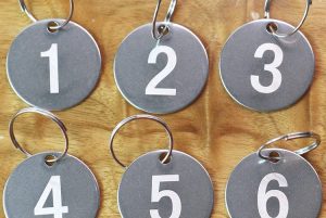 round metal tags with numbers 1248